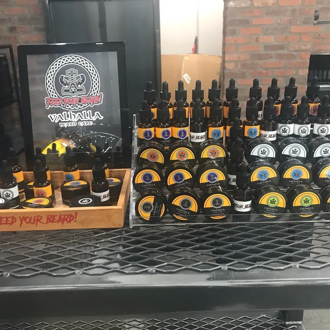 A table with many bottles of beer on it