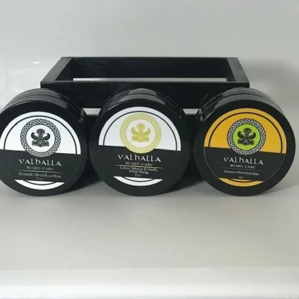 A wooden holder with three different flavors of cannabis.