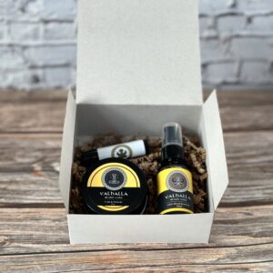 A box of beard oil and balm sitting on top of a table.