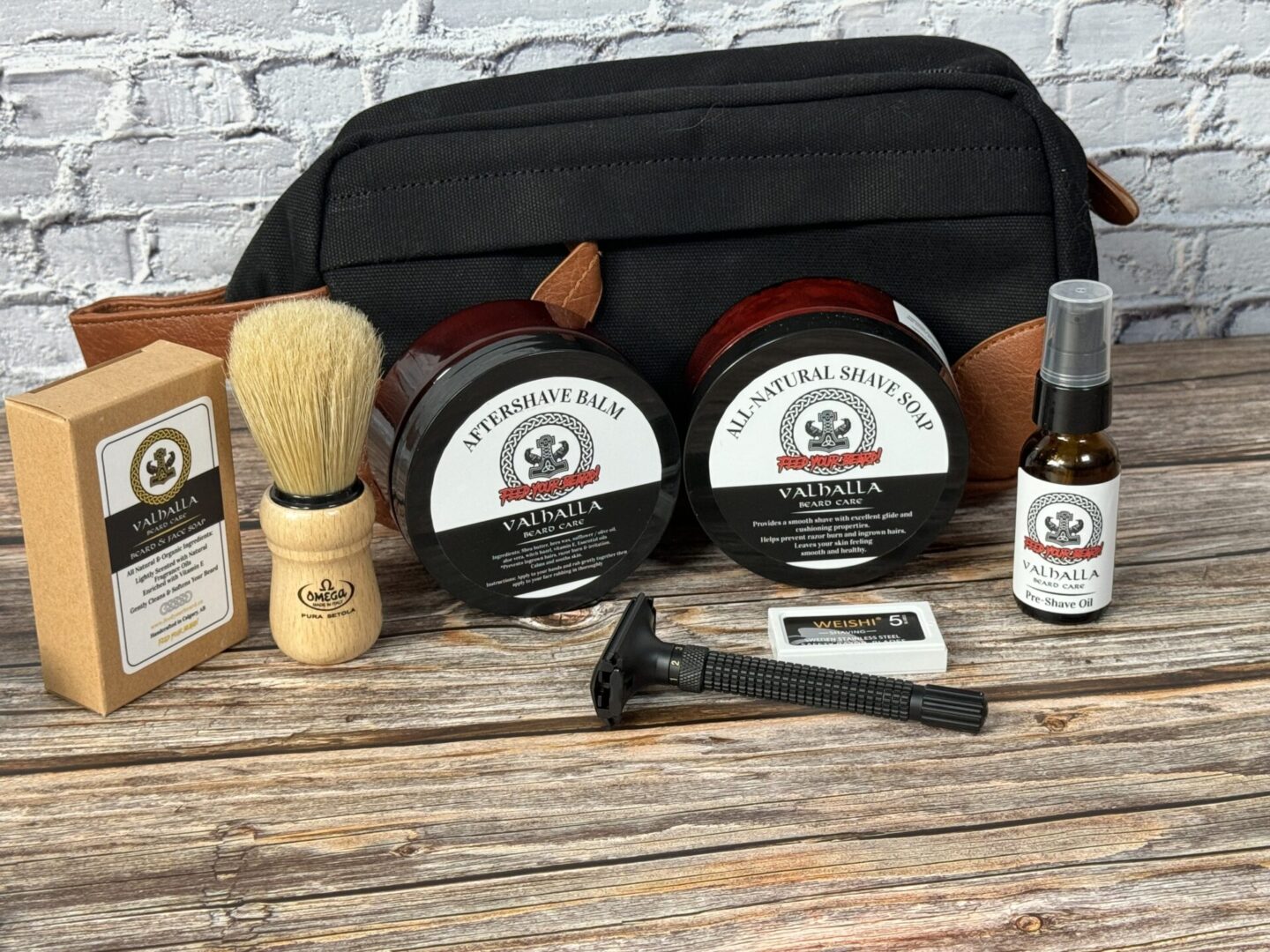 A wooden table with some shaving products on it
